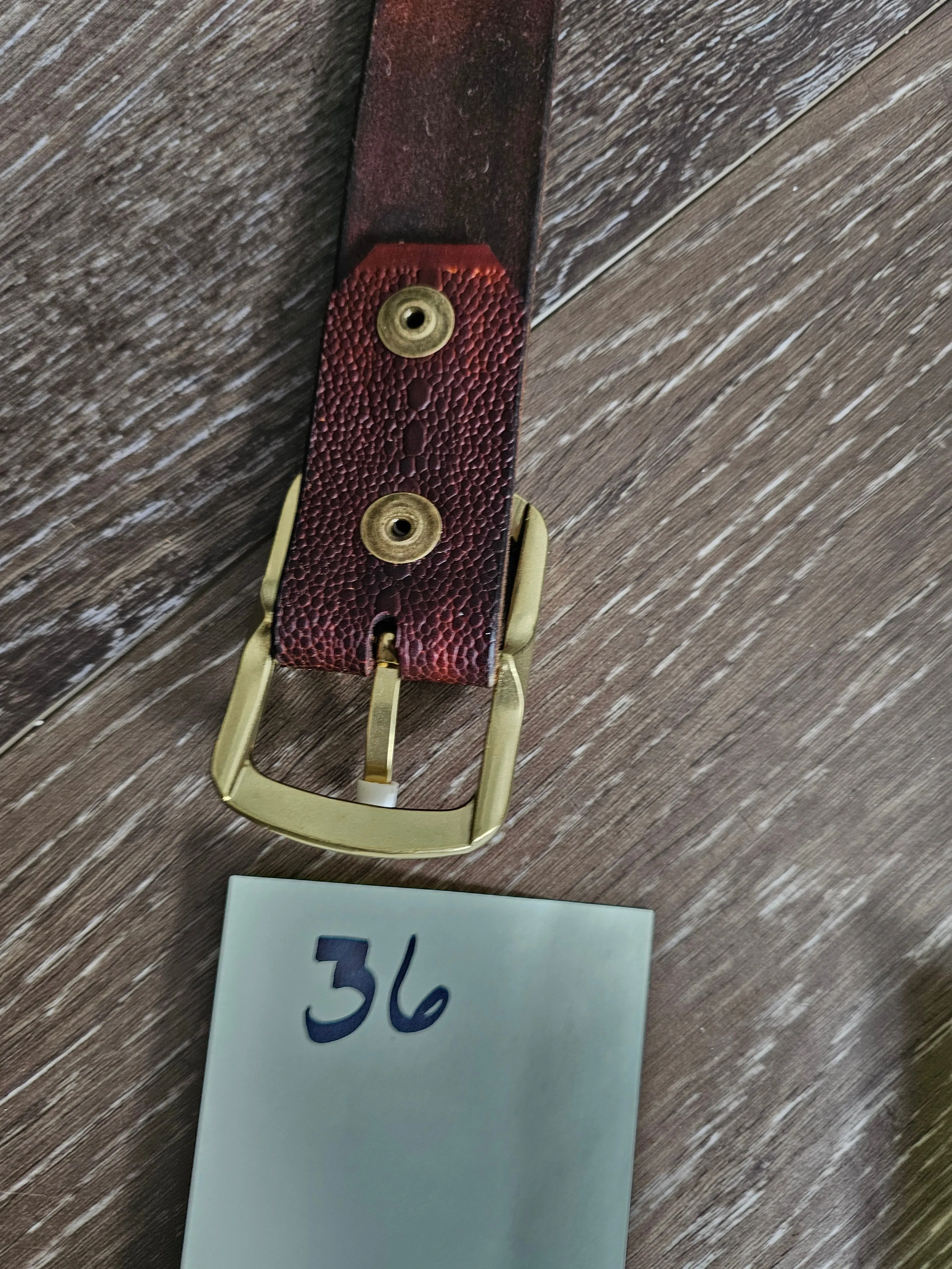 BELT LUXURY.  SOLID BRASS BUCKLE     EMBOSSED DARK REPTILE