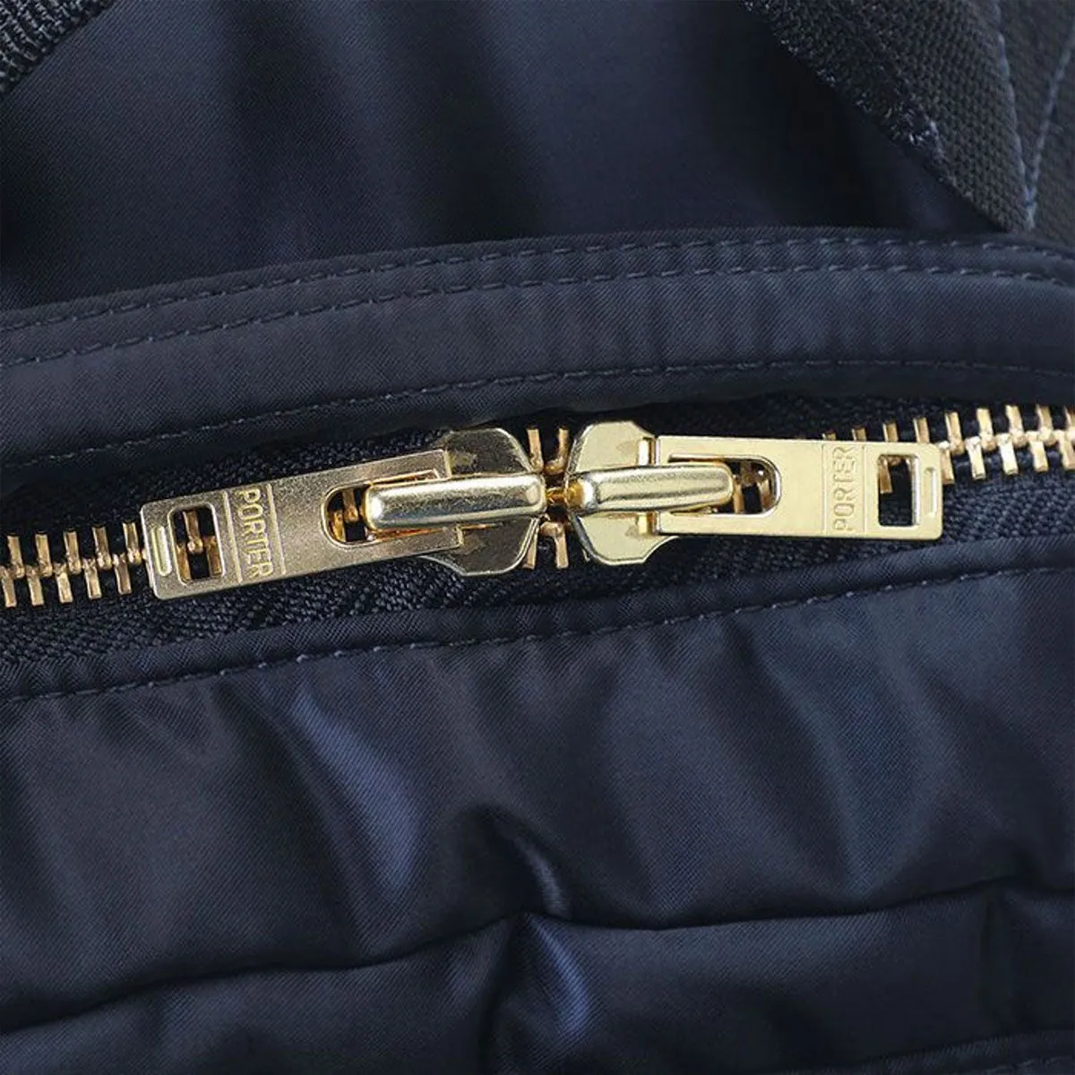 porter by yoshida tanker daypack (navy)
